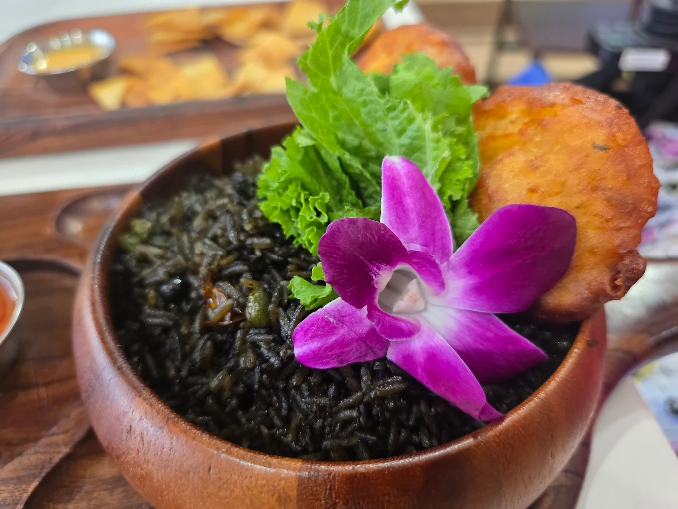 Djondjon rice with accra fritters at Mardee's Bistro